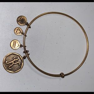 Alex and Ani initial K bracelet in a brassy gold color